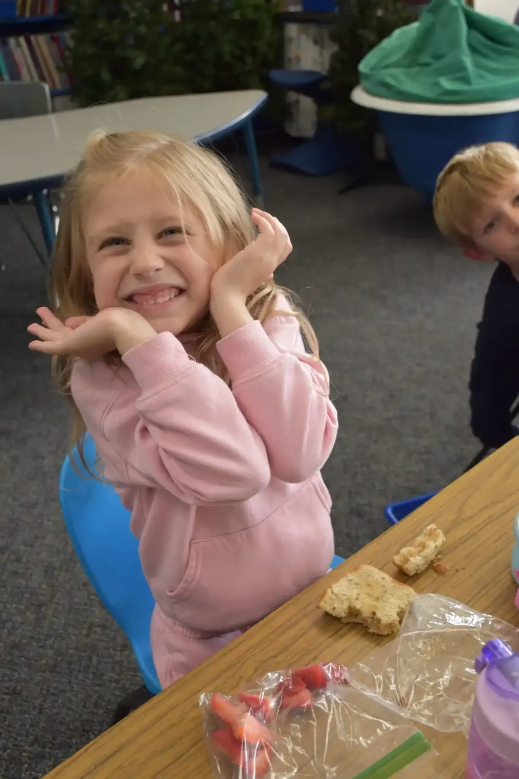 A young student at lunch