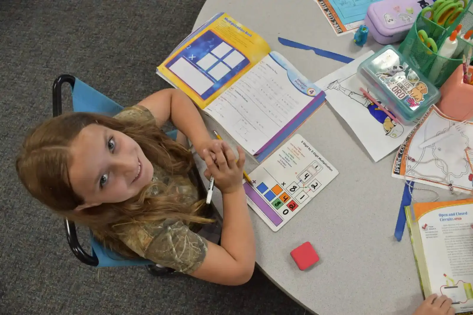 A student working through a math page