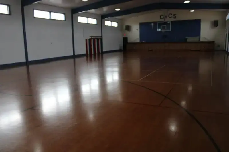 The CVCS gymnasium with its wooden floor